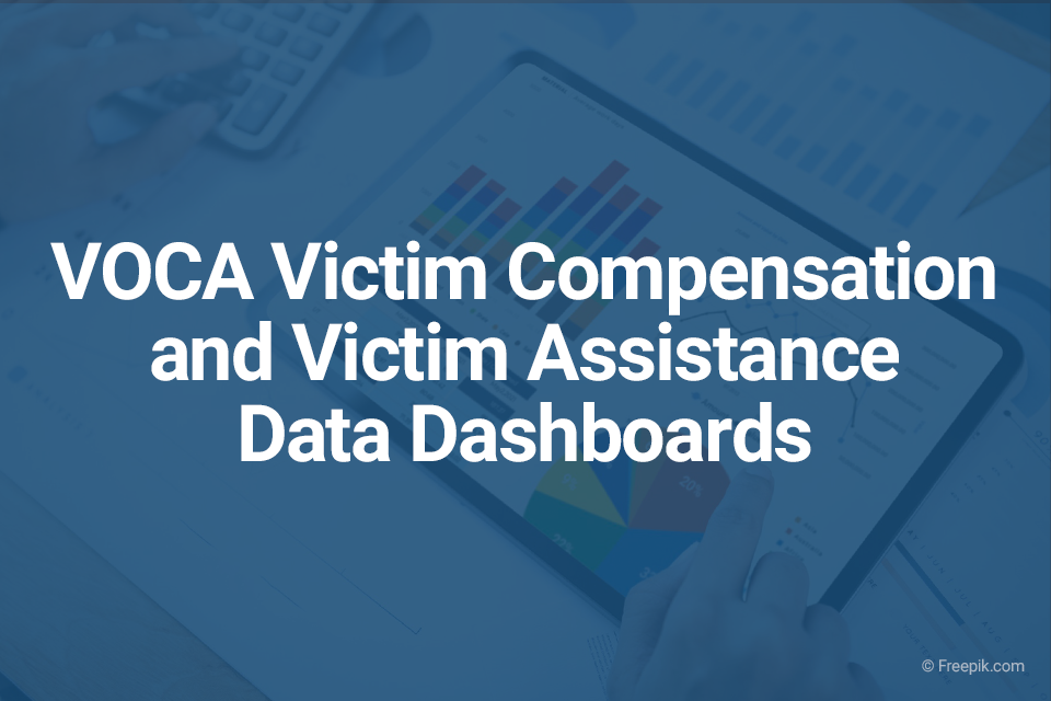 Bar and pie chart on a tablet. Text on the image reads "VOCA Victim Compensation and Victim Assistance Data Dashboards"